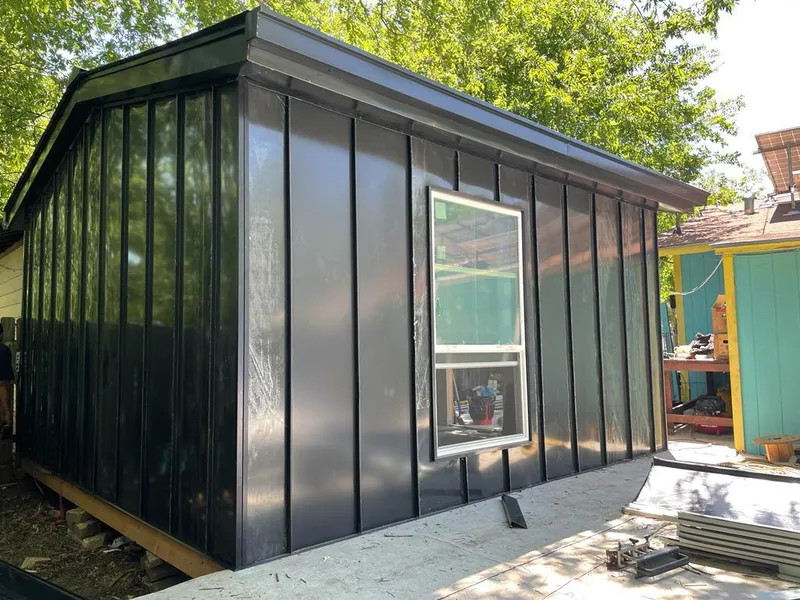 Black standing seam metal wall panels for Roof Inspection in McCandless