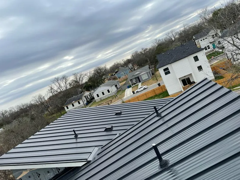 Standing seam metal roof panels with vents for Skylight Repair in McCandless